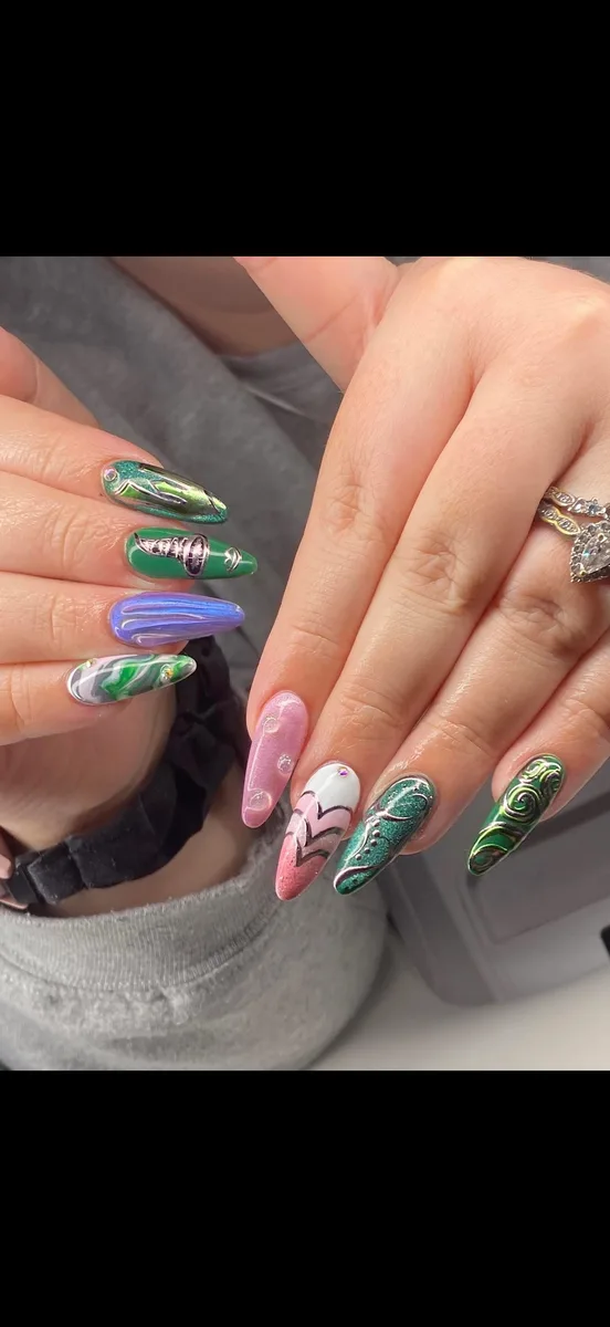 Green and purple chrome swirl nail art