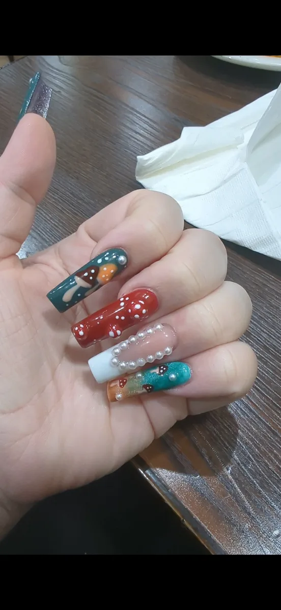 Mushroom and pearl nail art