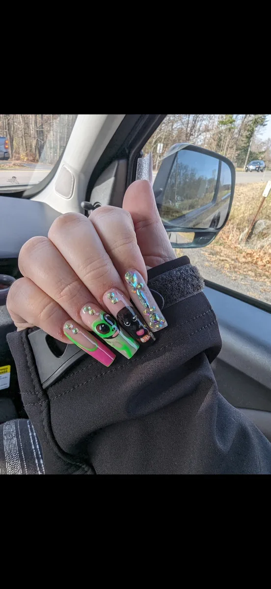 Neon green and pink cartoon nail art