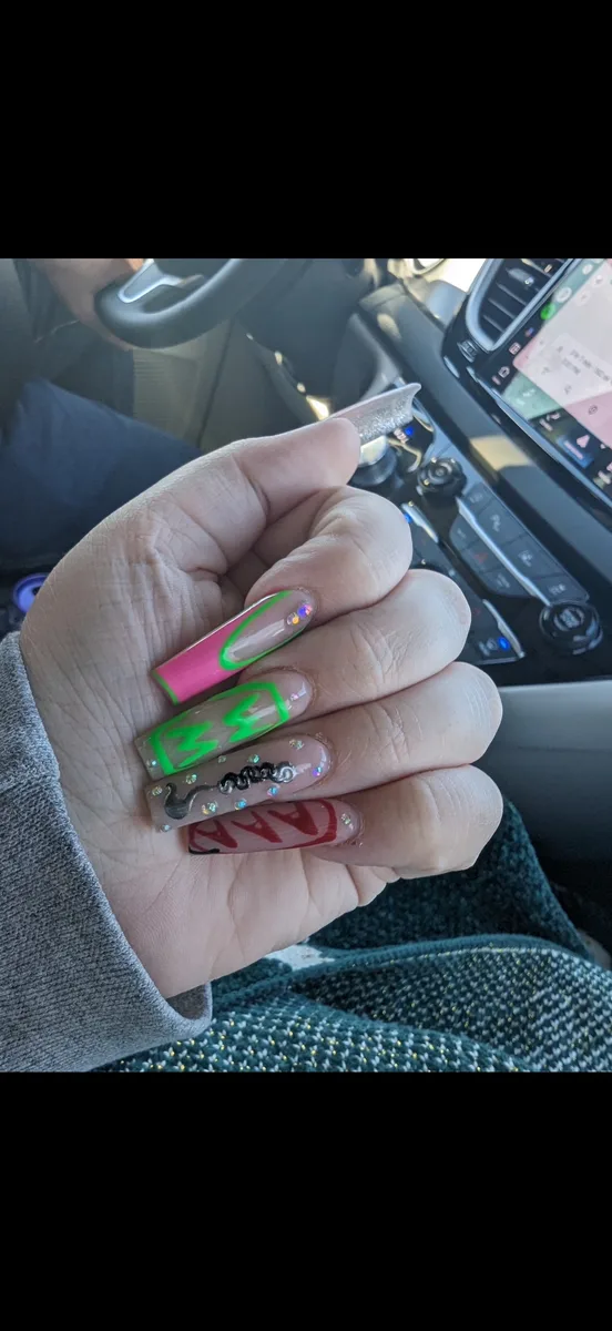 Neon green, pink and black graphic nail art